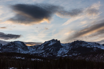 A beautiful sunset over the Rocky Mountains near Sprague Lake in Rocky Mountain National Park.