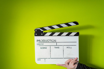 movie clapper on green  background