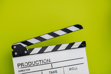 Obraz premium movie clapper on green background