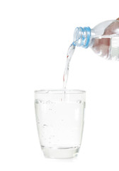 Pouring water into glass