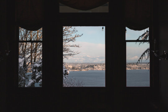 view of mountains through windows