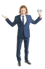 Handsome young businessman with money on white background