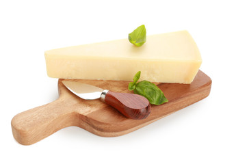 Board with tasty Parmesan cheese on white background