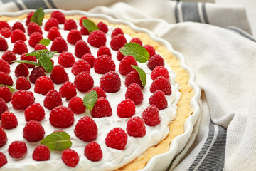 Tasty raspberry pie on table, closeup
