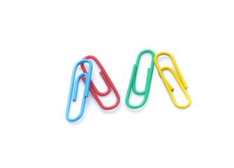 color paperclips on a white background