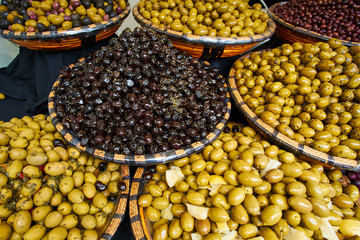 Green and black olives in the oriental market