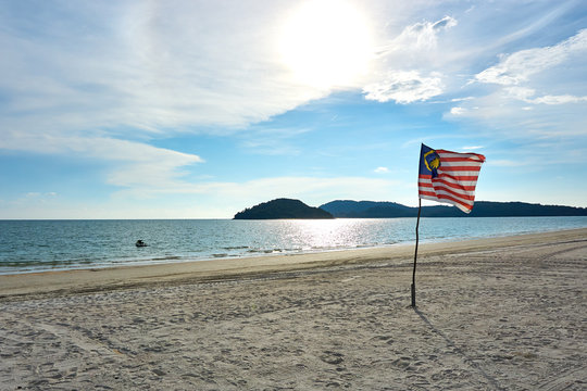 Langkawi, Malaysia - October 12, 2019. Malaysian flag at Cenang beach on langkawi