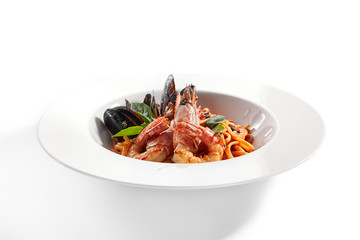 Delicious spaghetti with seafood and tomatoes