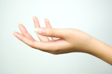 Beautiful hand of female on a white background. Concept beauty and hydration of the skin.