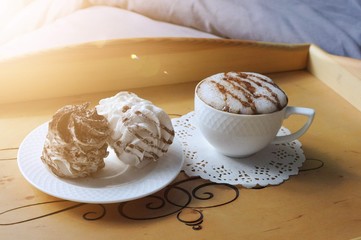 Homemade marshmallow zephyr with cup of coffee