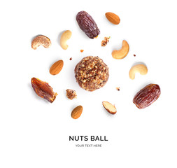 Creative layout made of nuts ball on the white background. Flat lay. Food concept. Macro concept.