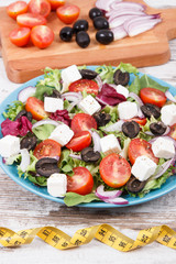 Greek salad with feta cheese and vegetables. Healthy lifestyles, food and slimming