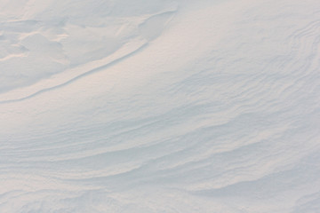 Snow on the frozen surface of the r iver on the Sunset, a natural background, Ob reservoir, Siberia