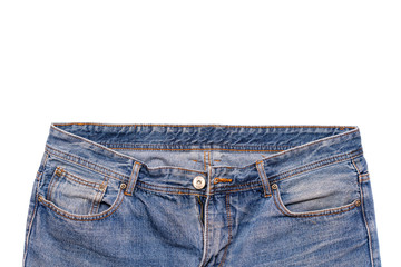 Various pieces of blue jeans isolated on a white background. The combination of fabric elements and...