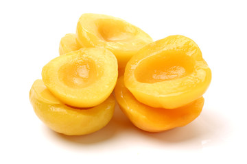 Fototapeta na wymiar peaches in syrup on a white background 