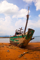 old fishing boat on the beach