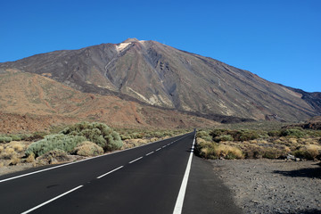 deserted road towards a volcano