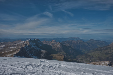 View from Mt. Titlis in Switzerland in winter. The Titlis is a mountain, located on the border between the Swiss cantons of Obwalden and Bern