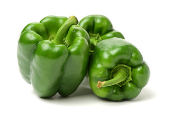 Obraz na płótnie Canvas fresh green bell pepper (capsicum) on a white background