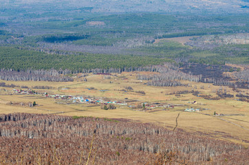 South Urals. Autumn mountains. Village in the mountains.