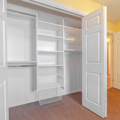 Square frame Empty white built in closet or wardrobe interior