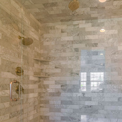 Square Interior of contemporary shower with stone tiles