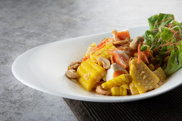 Delicious corn spicy salad, papaya salad, Thai Style food