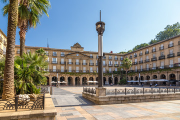 Bilbao, Spain. Plaza Nueva (New Square) and the building of the Academy of the Basque Language, 1890