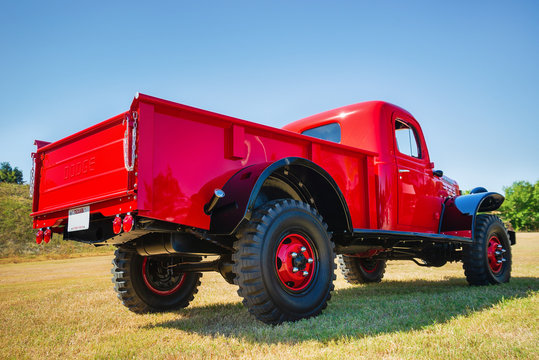 Back side view of a red vintage 1948 Dodge Power Wagon classic truck on October 19, 2019 in Westlake, Texas.