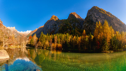 lake at sunset in the mountains, Val di Mello, Italy