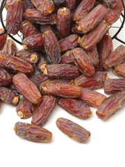 Delicious fresh organic dates on white background