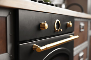 New modern oven in kitchen, closeup view