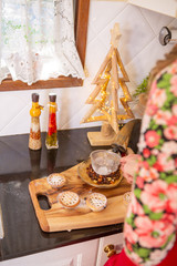 Dusting sweet pastry pies with sugar