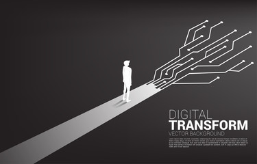 Silhouette of businessman standing on the way with dot connect line circuit. concept of digital transformation of business.