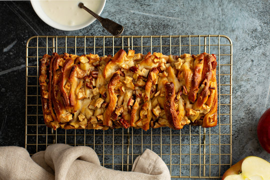 Apple pecan pull apart bread with cream cheese frosting