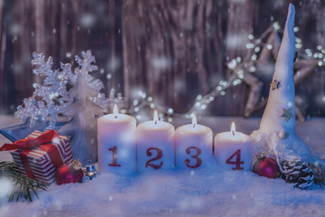 burning candles in romantic christmas mood on the holy evening