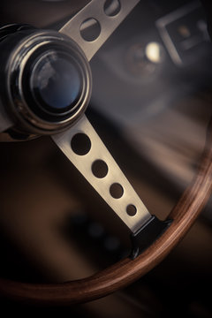 Wooden steering wheel of an old classic car