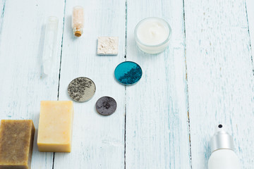 hygiene and beauty product samples, powder compact, spray, soap, moisturizer