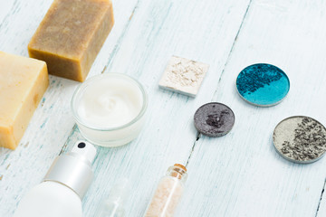 hygiene and beauty product samples, powder compact, spray, soap, moisturizer