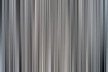 Abstract vertical pink lines background. Streaks are blurry in motion.