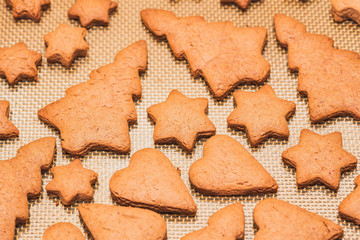 christmas gingerbread cookies on wooden background