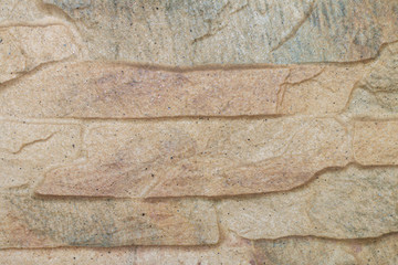 a horizontal light brown layered limestone background 