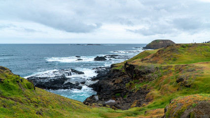 ocean meets the cliffs