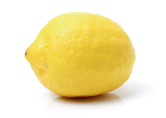 Ripe lemons on white background