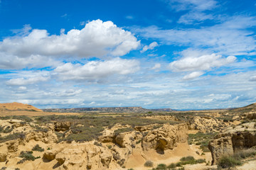 Fototapeta na wymiar Eroded hills and canyon in the Spanish semi-desert Bardenas Reales