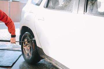White car at the sink in the foam