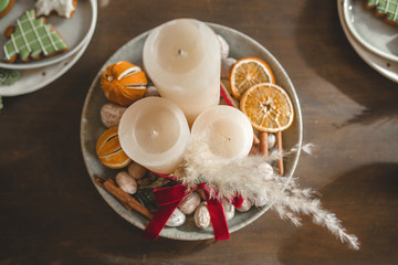 Christmas kitchen decor. Kitchenware on the table. Holiday decorations.