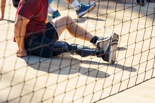 Parasporstman sitting during a volleyball match.Professional players .