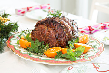Holiday Christmas prime rib beef roast on the table
