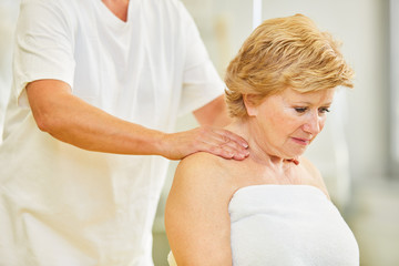 Senior patient gets a neck massage